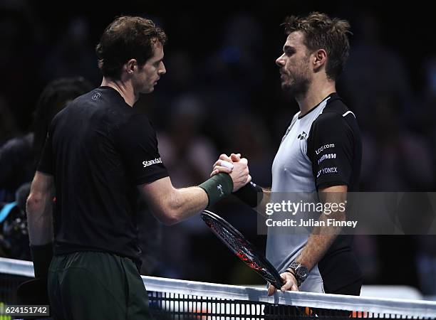 Stan Wawrinka of Switzerland congratulates Andy Murray of Great Britain after their men's singles match on day six of the ATP World Tour Finals at O2...