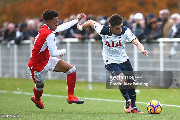 Anthony Georgiou of Tottenham Hotspur and Chris Willock of Arsenal in action during the Premier League 2 match between Tottenham Hotspur and Arsenal...
