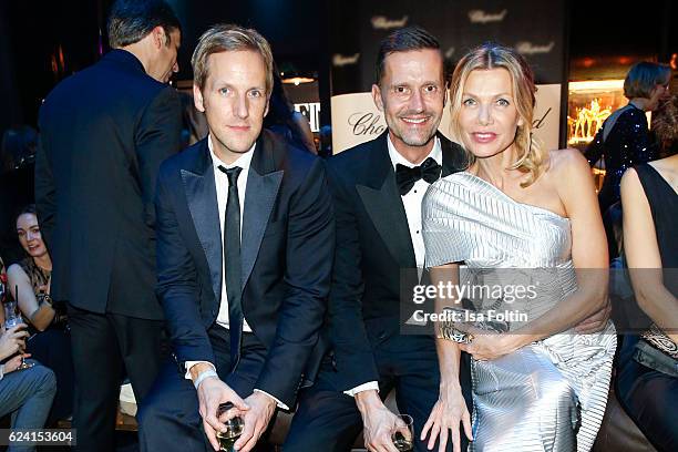 German moderator Jahn Hahn, Marco Stein and german actress Ursula Karven pose at the Bambi Awards 2016 party at Atrium Tower on November 17, 2016 in...