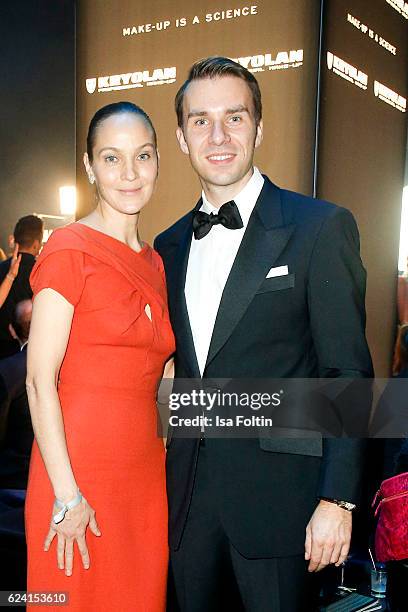 Jeanette Hain, Dominik Langer, CEO Kryolan poses at the Bambi Awards 2016 party at Atrium Tower on November 17, 2016 in Berlin, Germany.