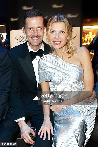 Marco Stein and german actress Ursula Karven pose at the Bambi Awards 2016 party at Atrium Tower on November 17, 2016 in Berlin, Germany.