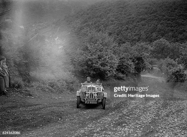 Wolseley Hornet competing in the Mid Surrey AC Barnstaple Trial, Beggars Roost, Devon, 1934. Artist: Bill Brunell.Wolseley Hornet 1932 1271 cc....