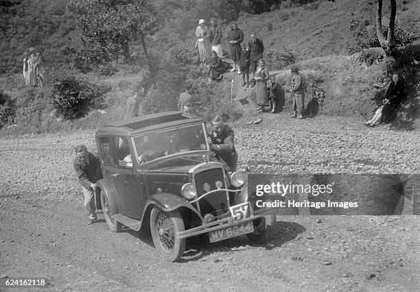 Austin 10 saloon at the Mid Surrey AC Barnstaple Trial, Beggars Roost, Devon, 1934. Artist: Bill Brunell.Austin 10 Saloon 1932 Vehicle Reg. No....