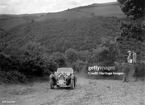 Singer sports competing in the Mid Surrey AC Barnstaple Trial, Beggars Roost, Devon, 1934. Artist: Bill Brunell.Singer Sports 1934 972 cc. Vehicle...