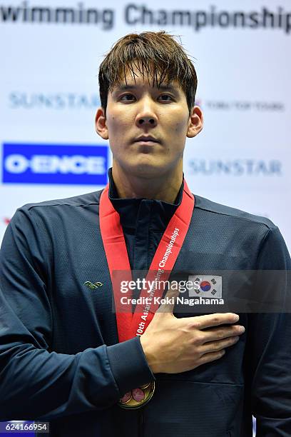 Gold medalist Taehwan Park of South Korea stands for his national antem in Men's 400m Freestyle final during the 10th Asian Swimming Championships...
