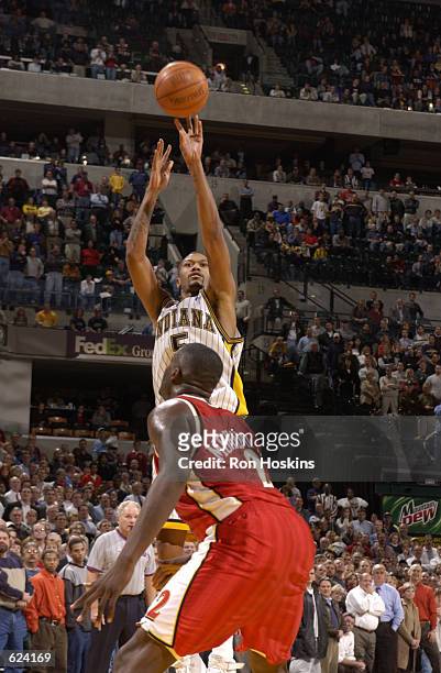 Jalen Rose of the Indiana Pacers takes the shot to put the Pacers up over the Atlanta Hawks 99-98 with 1:01 remaining in the fourth period during a...