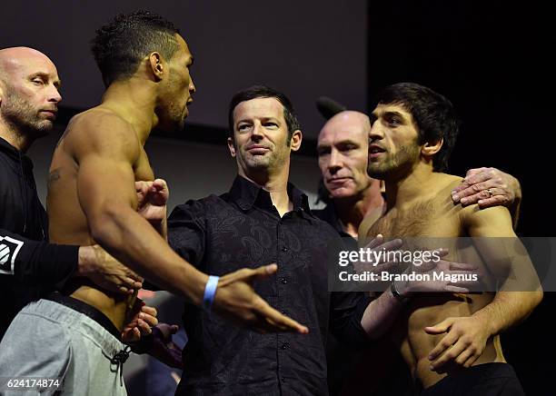 Kevin Lee of the United States and Magomed Mustafaev of Russia face off during the UFC Fight Night weigh-in at the SSE Arena on November 18, 2016 in...