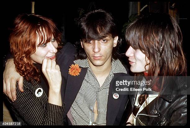 Portrait of musicians Johnny Thunders and Phillipe Marcade as they pose at CBGBs nightclub, New York, New York, December 1975.