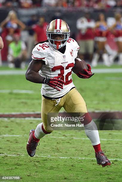 DuJuan Harris of the San Francisco 49ers runs with the ball against the Arizona Cardinals at University of Phoenix Stadium on November 13, 2016 in...