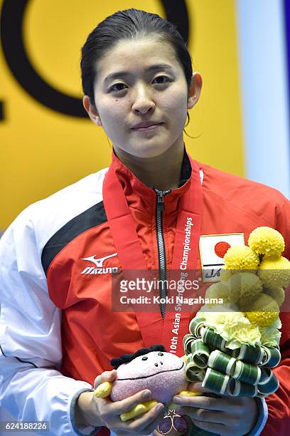 Emi Moronuki of Japan looks on after Women's 100m Backstroke final race during the 10th Asian Swimming Championships 2016 at the Tokyo Tatsumi...