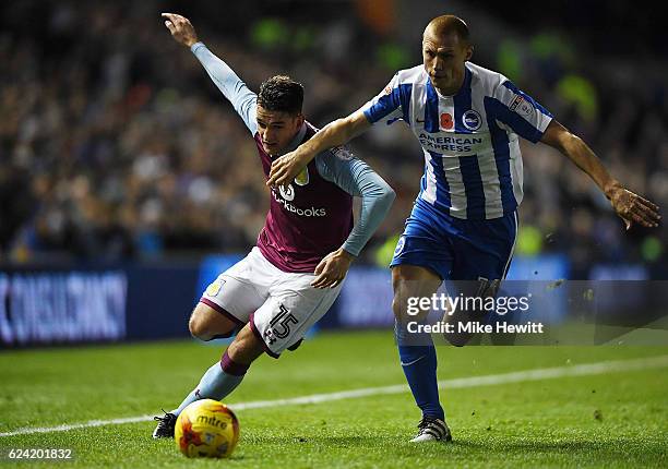 Steve Sidwell of Brighton challenges Ashley Westwood of Aston Villa during the Sky Bet Championship match between Brighton & Hove Albion and Aston...