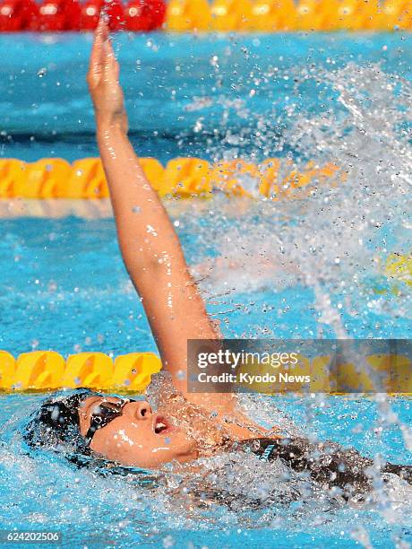 Spain - Photo shows Aya Terakawa of Japan during the final of the women's 100-meter backstroke at the world swimming championships in Barcelona on...