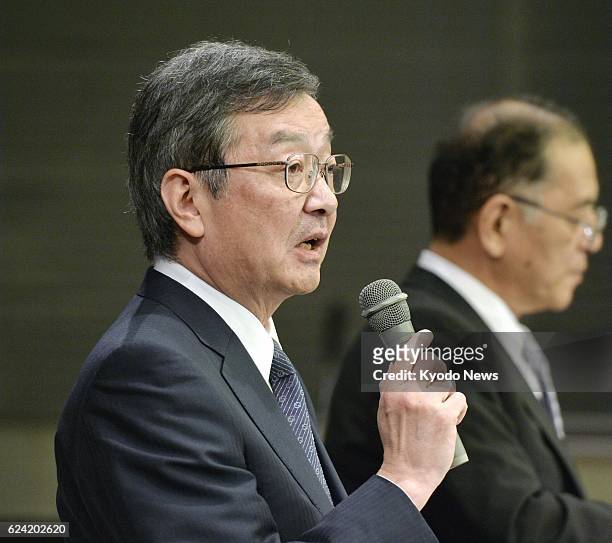 Japan - Sharp Corp. President Kozo Takahashi talks about the struggling Japanese electronics maker's quarterly earnings during a press conference in...