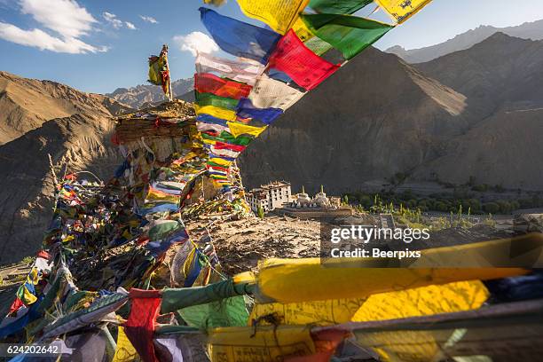 prayer flags on the top of mountain near lamayuru monastery, leh ladakh, india. - india nepal stock pictures, royalty-free photos & images