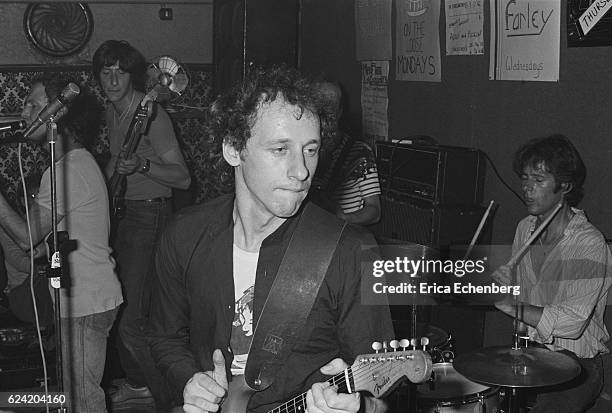 Guitarist Mark Knopfler and drummer Pick Withers, both later of Dire Straits, perform on stage with their eralier band Cafe Racers in a pub in...