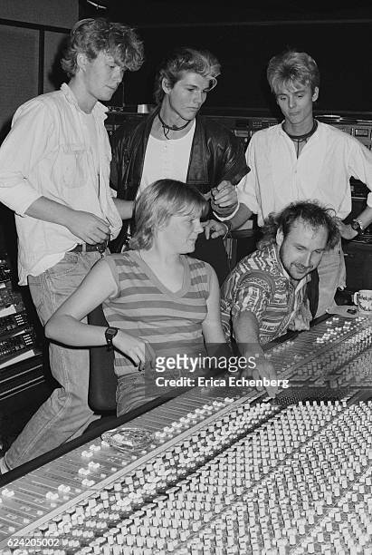 Ha with prodcuer Tony Mansfield in the control room during the recording of their first album 'Hunting High And Low' at Eel Pie Studios, Twickenham,...