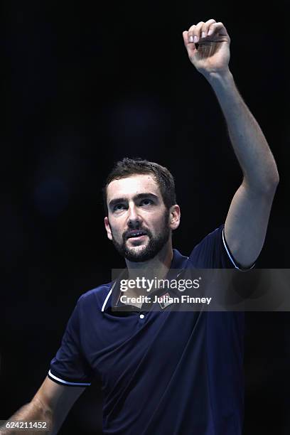 Marin Cilic of Croatia celebrates victory during the men's singles match against Kei Nishikori of Japan on day six of the ATP World Tour Finals at O2...