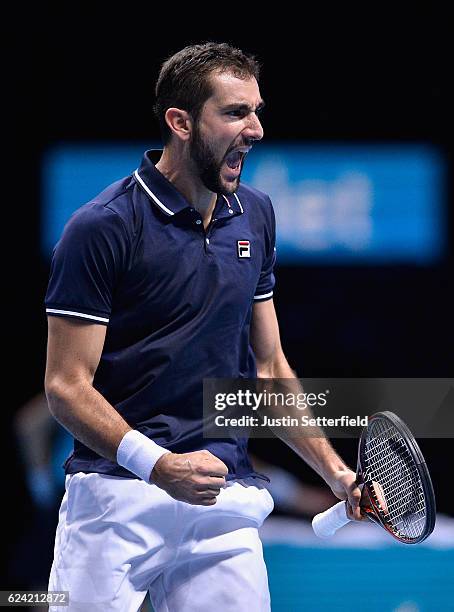 Marin Cilic of Croatia celebrates a point during the men's singles match against Kei Nishikori of Japan on day six of the ATP World Tour Finals at O2...