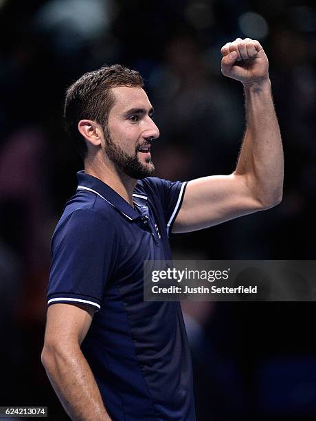 Marin Cilic of Croatia celebrates victory during the men's singles match against Kei Nishikori of Japan on day six of the ATP World Tour Finals at O2...