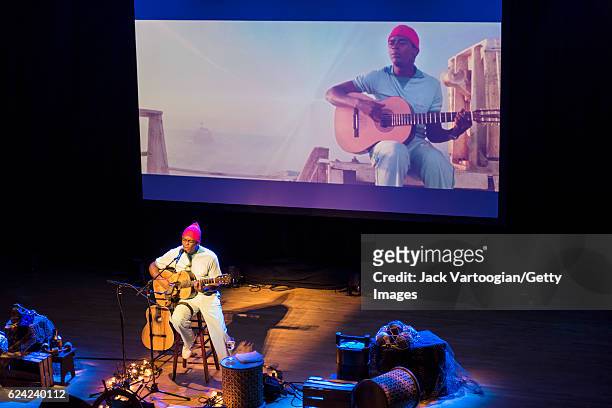 Brazilian musician Seu Jorge plays guitar as he performs 'The Life Aquatic - A Tribute to David Bowie,' presented by World Music Institute and le...