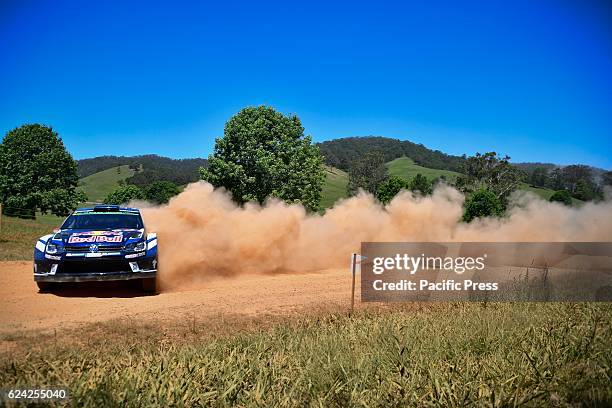 Jari-Matt Latbala and co-driver Miikka Anttila drive their Volkswagen Motorsport Polo R during day two of Rally Australia, the 14th and final round...