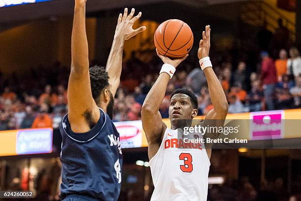 Andrew White III of the Syracuse Orange shoots the ball pas Chris Brady of the Monmouth Hawks during the first half on November 18, 2016 at The...