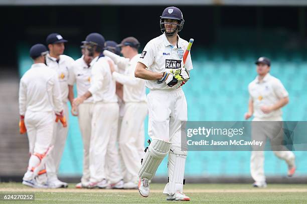 Kurtis Patterson of the Blues walks back to the pavilion after being dismissed by John Holland of the Bushrangers during day three of the Sheffield...