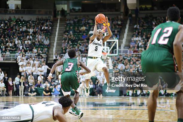 Cassius Winston of the Michigan State Spartans looks to pass the basketball against the Mississippi Valley State Delta Devils at the Breslin Center...