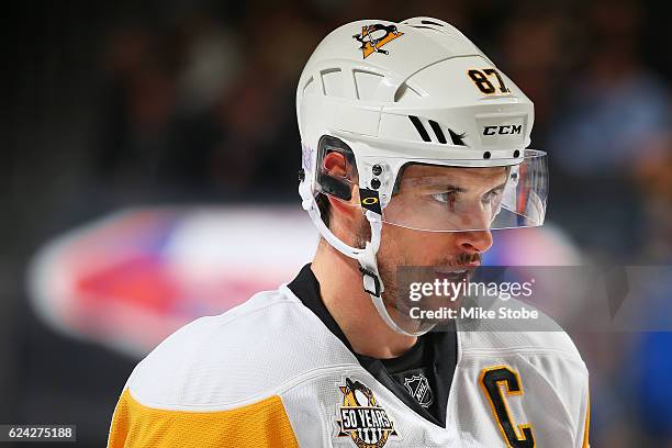 Sidney Crosby of the Pittsburgh Penguins looks on against the New York Islanders at the Barclays Center on November 18, 2016 in Brooklyn borough of...