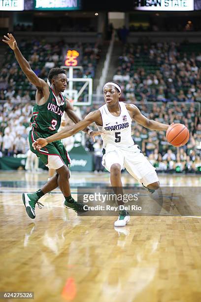 Cassius Winston of the Michigan State Spartans drives tot he basket against Darrell Riley of the Mississippi Valley State Delta Devils at the Breslin...