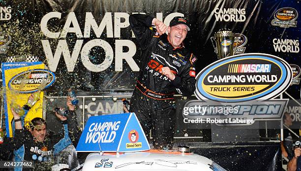 Johnny Sauter, driver of the Allegiant Travel Chevrolet, celebrates in Victory Lane after winning the NASCAR Camping World Truck Series Championship...
