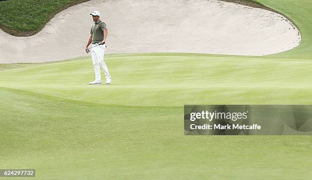 Adam Scott of Australia reacts to missing a putt on the 18th green during day three of the Australian golf Open at Royal Sydney GC at Royal Sydney...