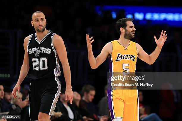 Jose Calderon of the Los Angeles Lakers reacts to a called foul as Manu Ginobili of the San Antonio Spurs looks on during the second half of a game...