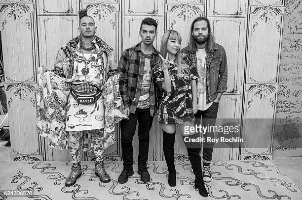 Cole Whittle, Joe Jonas, JinJoo and Jack Lawless of DNCE speak at The Build Series at AOL HQ on November 18, 2016 in New York City.