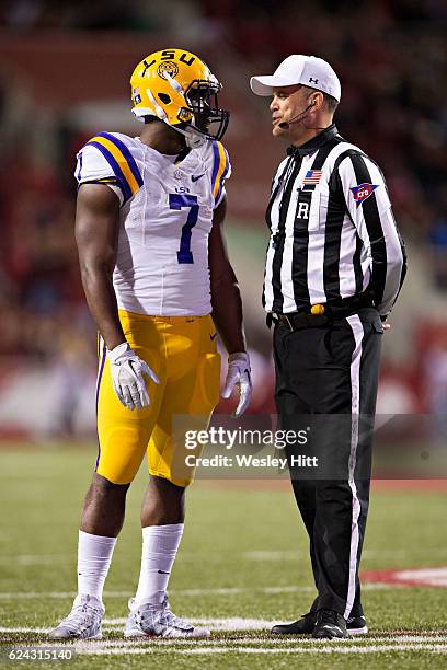 Leonard Fournette of the LSU Tigers talks with a official during a game against the Arkansas Razorbacks at Razorback Stadium on November 12, 2016 in...