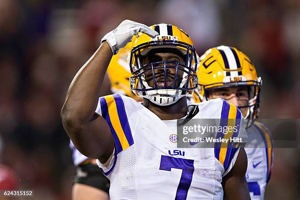 Leonard Fournette of the LSU Tigers celebrates after scoring a touchdown during a game against the Arkansas Razorbacks at Razorback Stadium on...