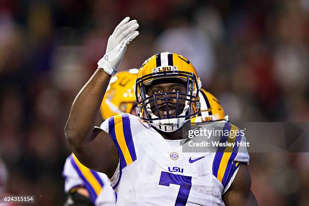 Leonard Fournette of the LSU Tigers celebrates after scoring a touchdown during a game against the Arkansas Razorbacks at Razorback Stadium on...