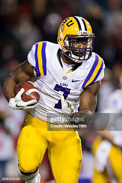 Leonard Fournette of the LSU Tigers runs the ball during a game against the Arkansas Razorbacks at Razorback Stadium on November 12, 2016 in...