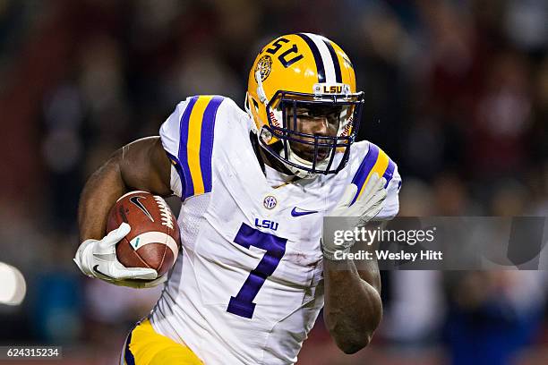 Leonard Fournette of the LSU Tigers runs the ball during a game against the Arkansas Razorbacks at Razorback Stadium on November 12, 2016 in...