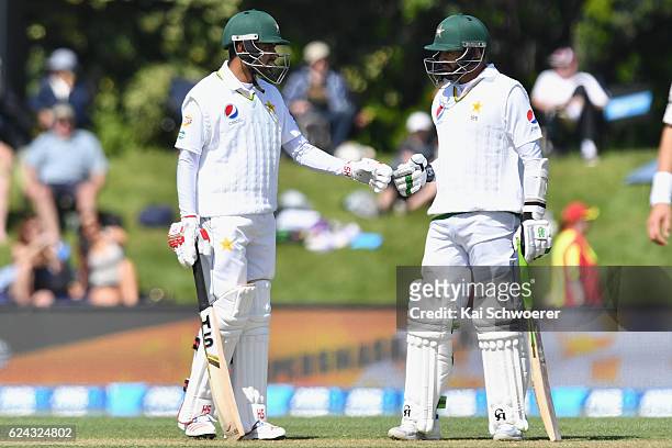 Babar Azam and Azhar Ali of Pakistan reacting during day three of the First Test between New Zealand and Pakistan at Hagley Oval on November 19, 2016...