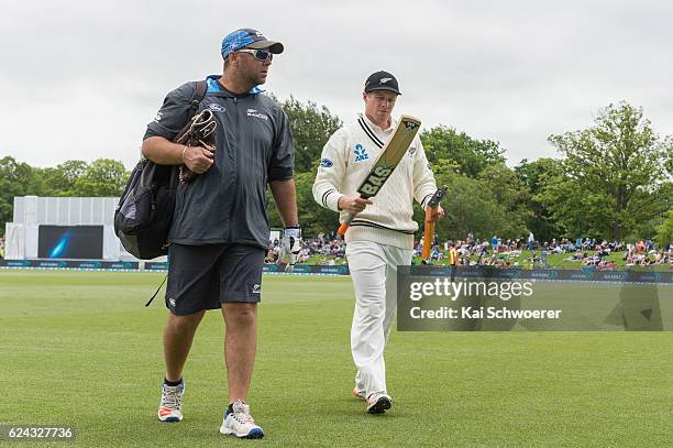 Batting Coach Craig McMillan and Henry Nicholls of New Zealand look on during day three of the First Test between New Zealand and Pakistan at Hagley...