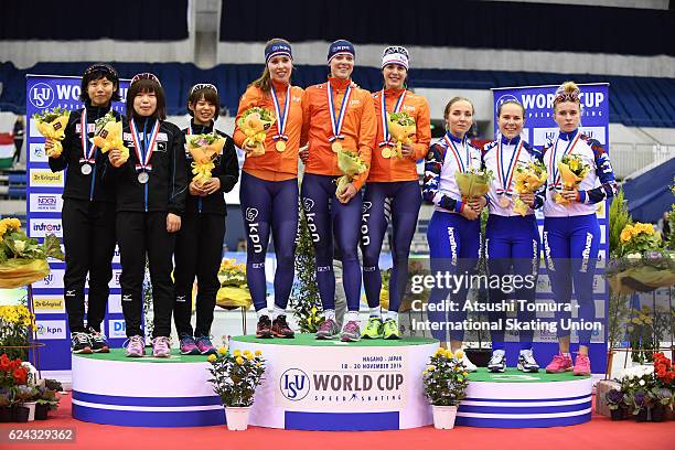 Team Japan , Team Netherlands and Team Russia pose on the podium in the medal ceremony for the Ladies team pursuit at M Wave on November 19, 2016 in...