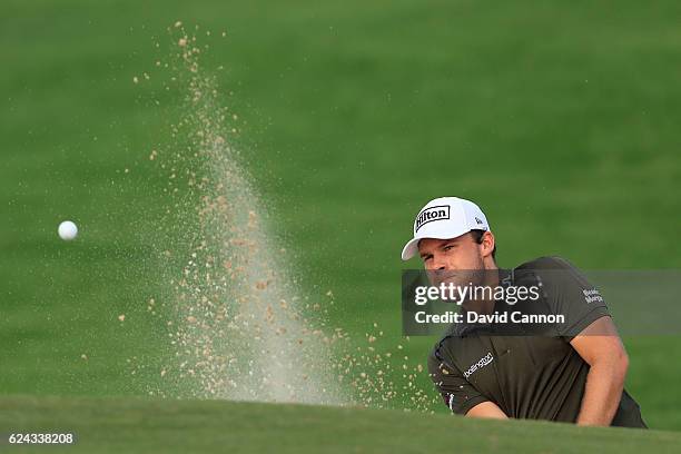 Tyrrell Hatton of England hits his third shot on the 14th hole during day three of the DP World Tour Championship at Jumeirah Golf Estates on...