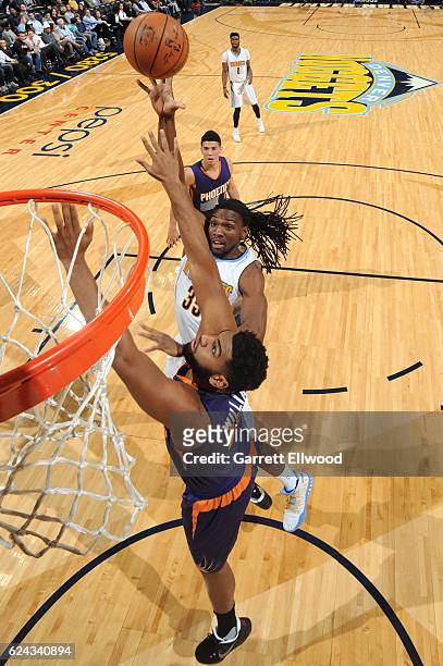 Kenneth Faried of the Denver Nuggets shoots the ball against the Phoenix Suns on November 16, 2016 at the Pepsi Center in Denver, Colorado. NOTE TO...