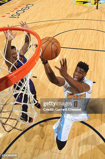 Emmanuel Mudiay of the Denver Nuggets drives to the basket against the Phoenix Suns on November 16, 2016 at the Pepsi Center in Denver, Colorado....