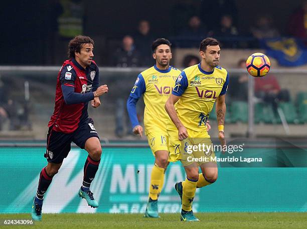 Ivan Radovanovic of Chievo competes for the ball with Davide Di Gennaro of Cagliari during the Serie A match between AC ChievoVerona and Cagliari...