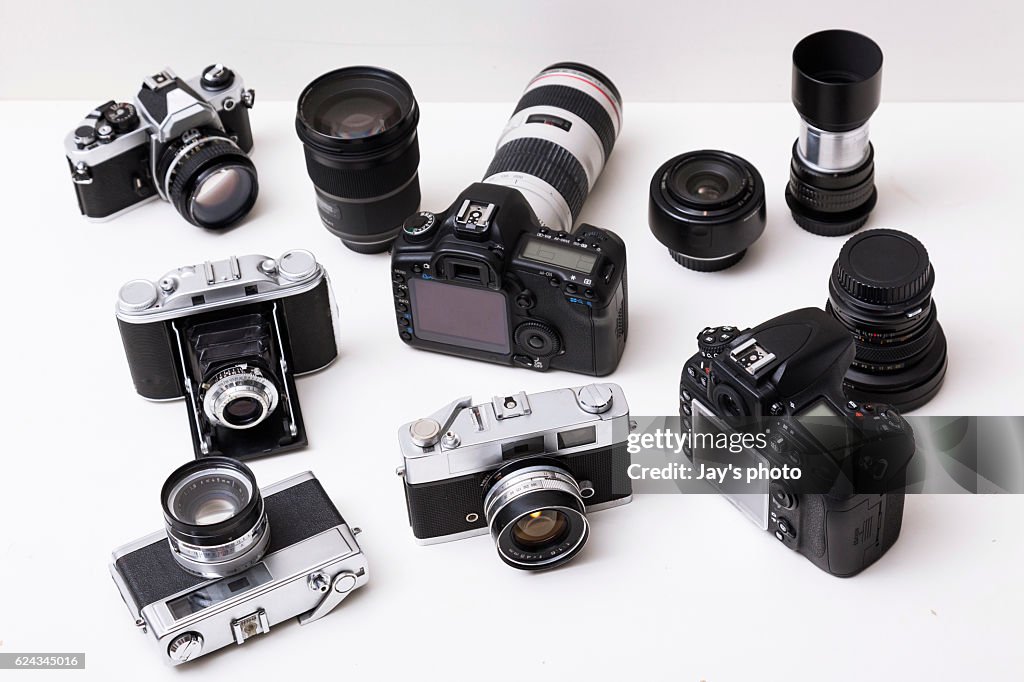 Lens and cameras