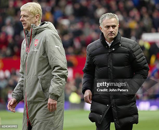 Manager Jose Mourinho of Manchester United and Manager Arsene Wenger of Arsenal shake hands after the touchline during the Premier League match...