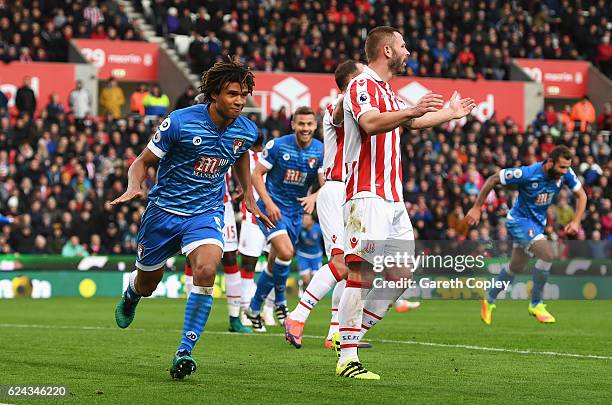 Nathan Ake of AFC Bournemouth celebrates scoring his sides first goal during the Premier League match between Stoke City and AFC Bournemouth at...