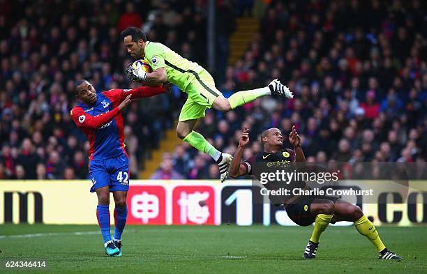 Claudio Bravo of Manchester City collects the ball, while under pressure from Jason Puncheon of Crystal Palace during the Premier League match...